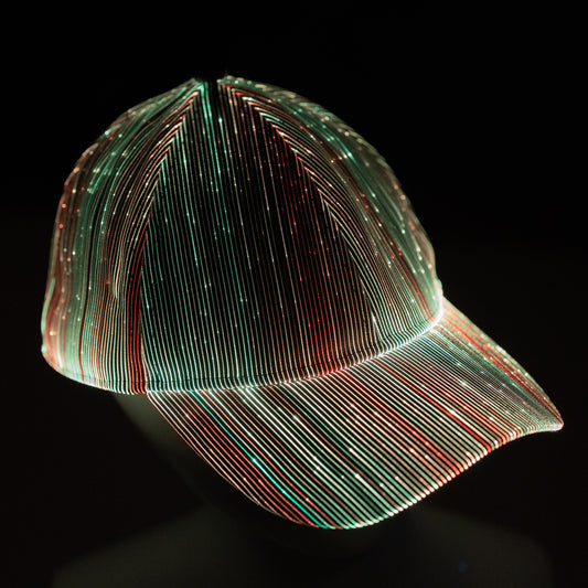 fiber optic LED snapback glowing in bright multicolor light on a dark background