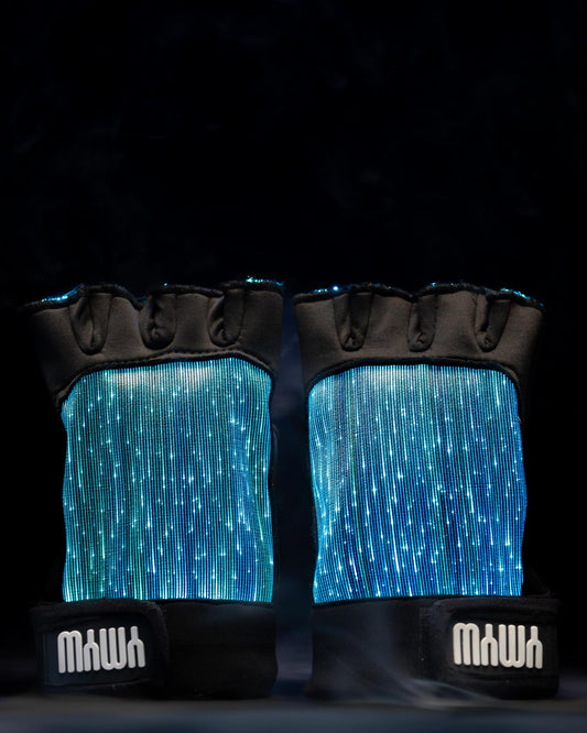 Pair of black fiber optic light up gloves illuminated in blue light against a dark background