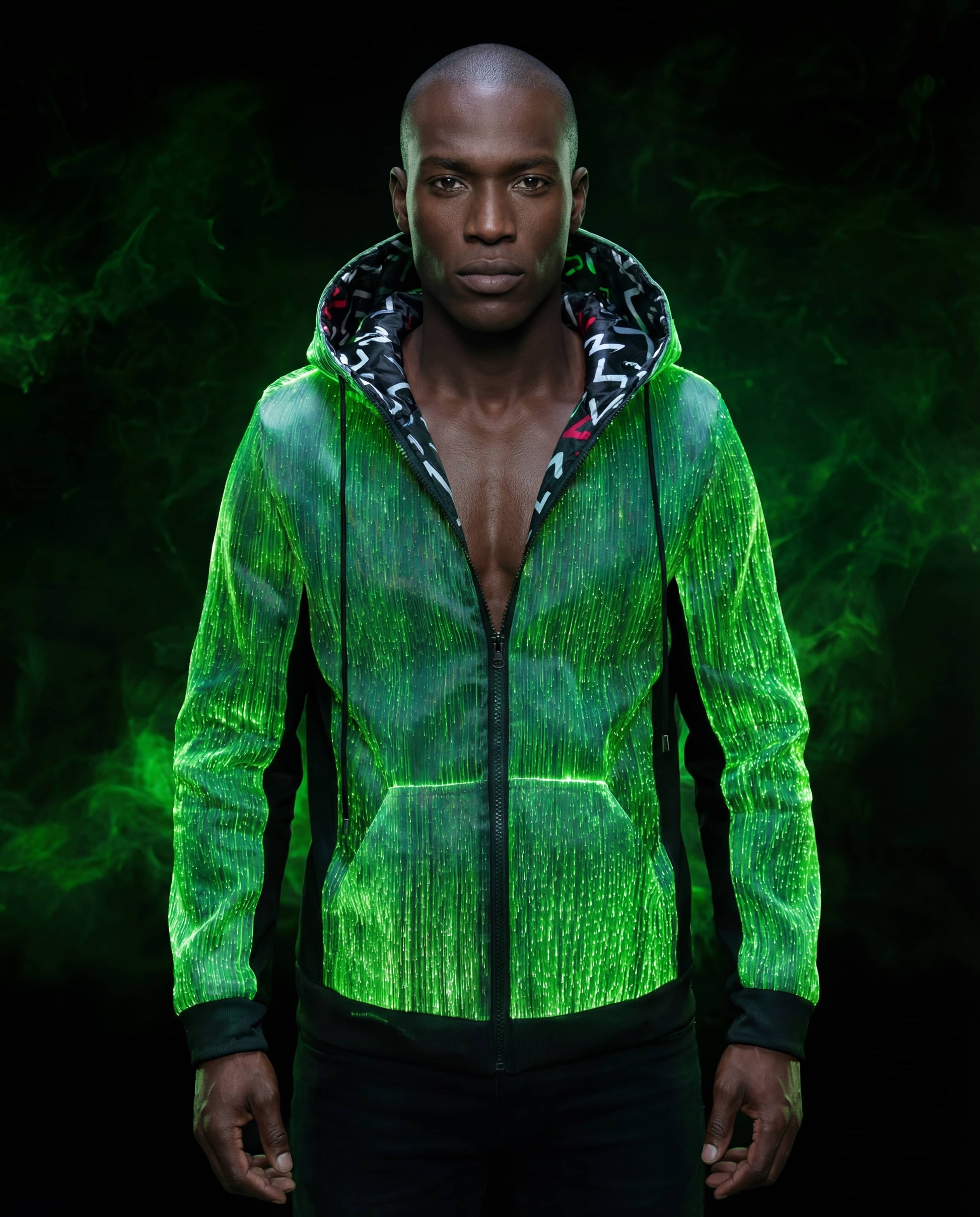 Man wearing a glowing green fiber-optic hoodie against a dark green smoke-filled background