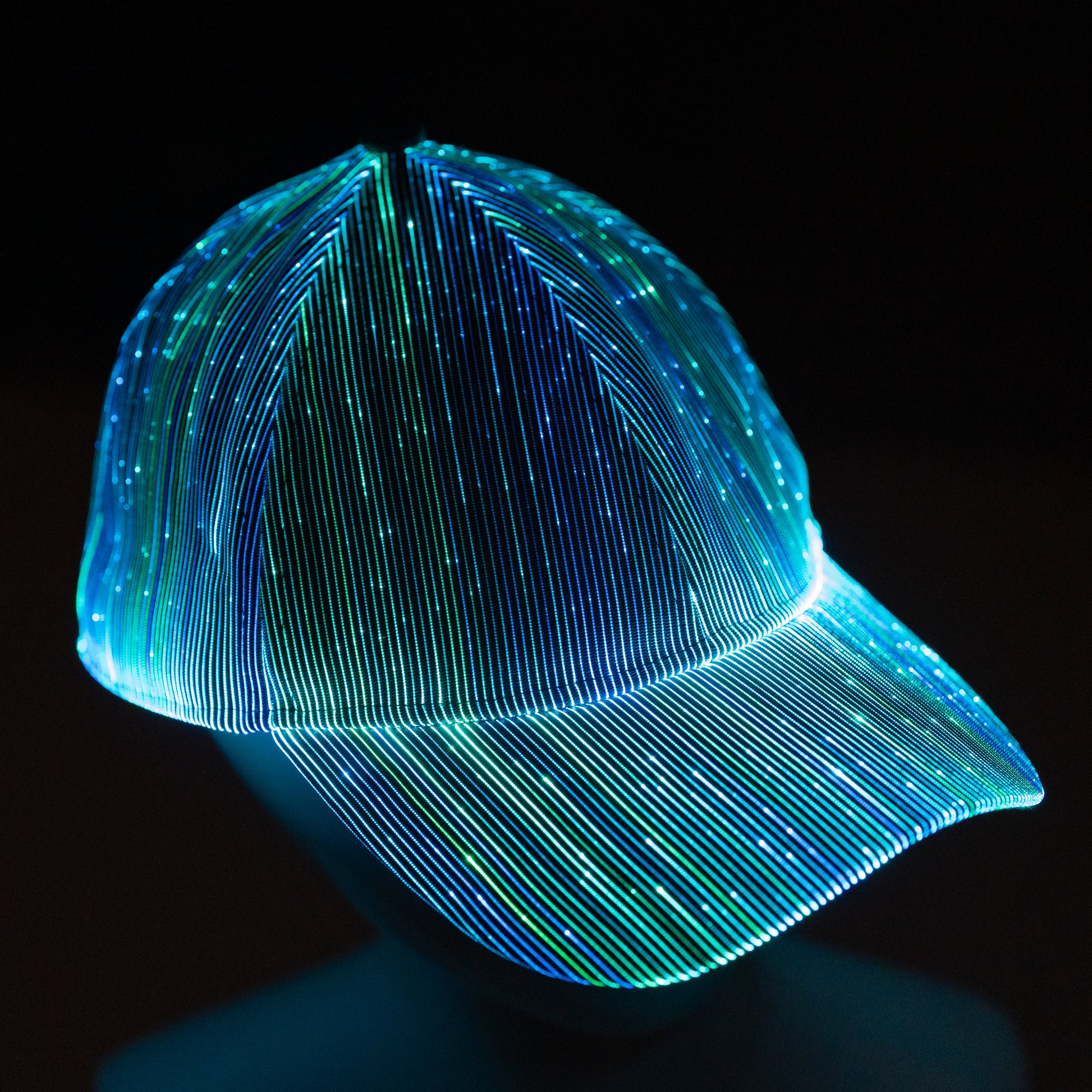 fiber optic LED snapback glowing in light blue light on a dark background
